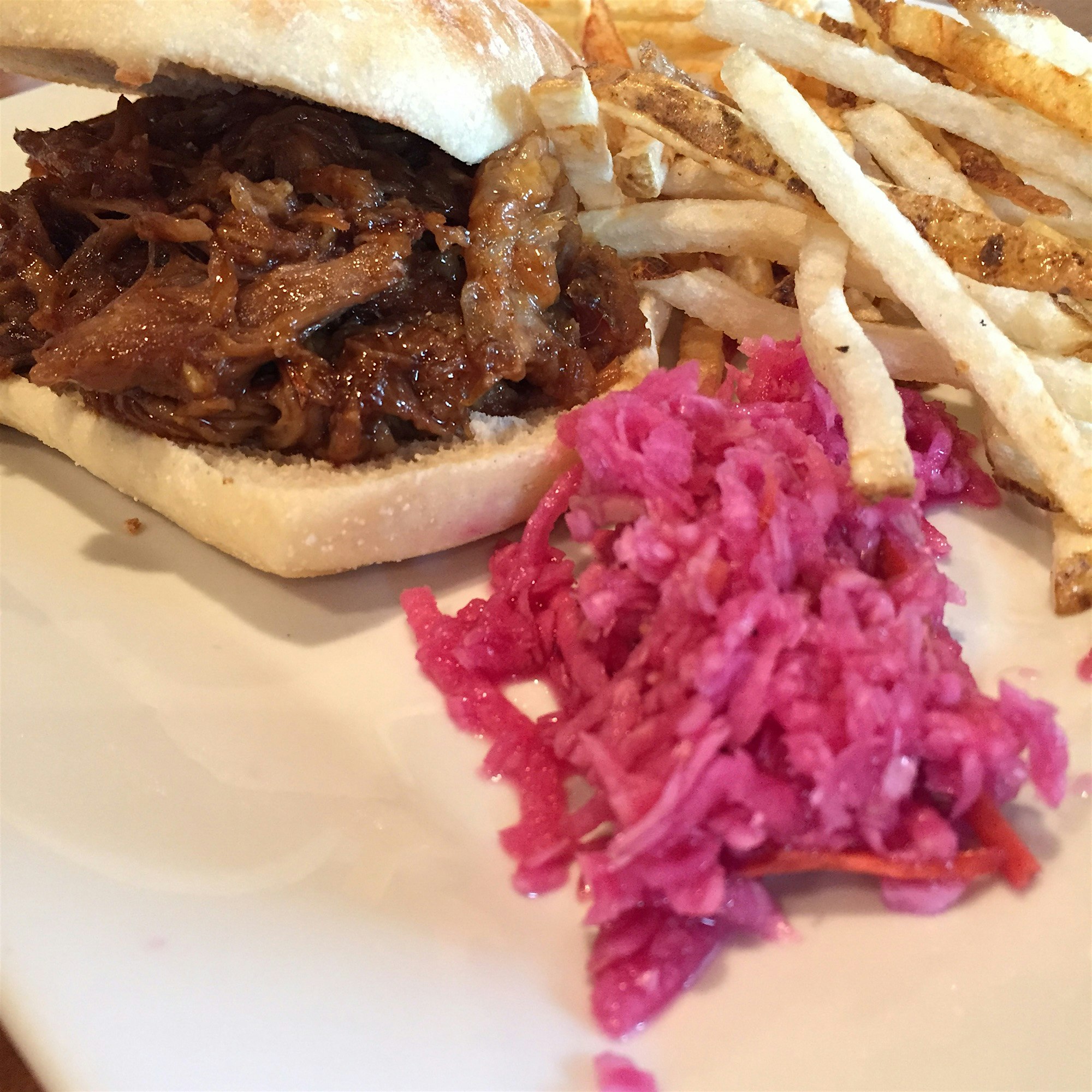 This was a surprising and delicious pulled pork sandwich with jicama and Carrie slaw from a new r...