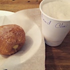 Donut and chai latte with almond milk.