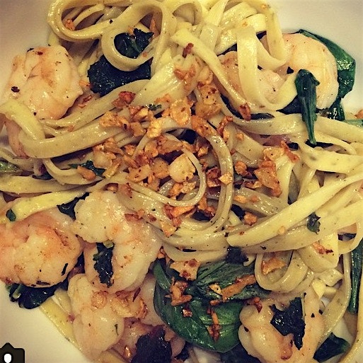 Lemon and black pepper shrimp with fresh linguini di cavolo and fava leaves.