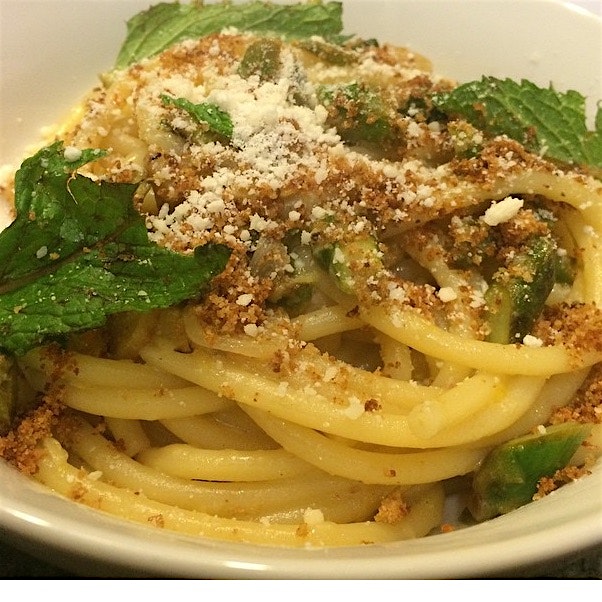 Spring bucatini pasta with pea tips, asparagus and mint.