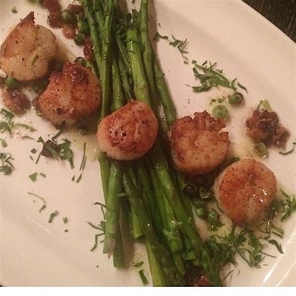 Seared sea scallops - charred asparagus, sweet peas, pancetta, smoked parsnip purée.