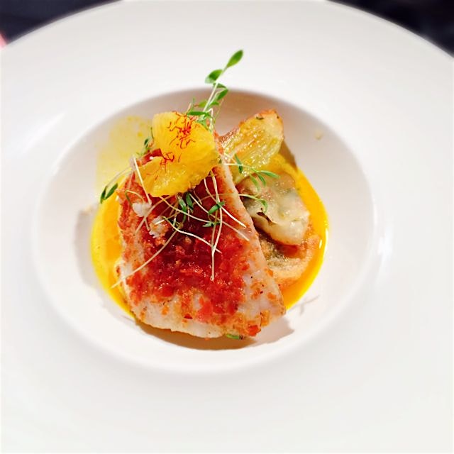 Country Ham Crusted Gulf Cobia with Spiny Lobster Gyoza, Caramelized Bany Bok Choi, and a Florida...