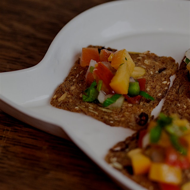 Add the homemade persimmon pico de gallo with some farmstand flax crackers! POW!
