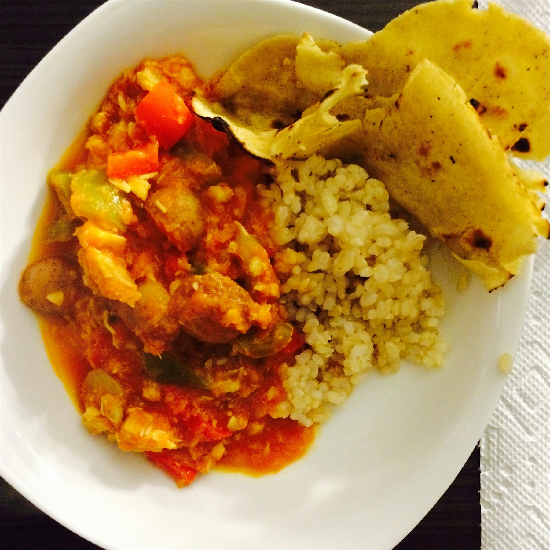 Complete! flounder And atlantic cod fish curry with brown rice and a freshly fluffed roti!