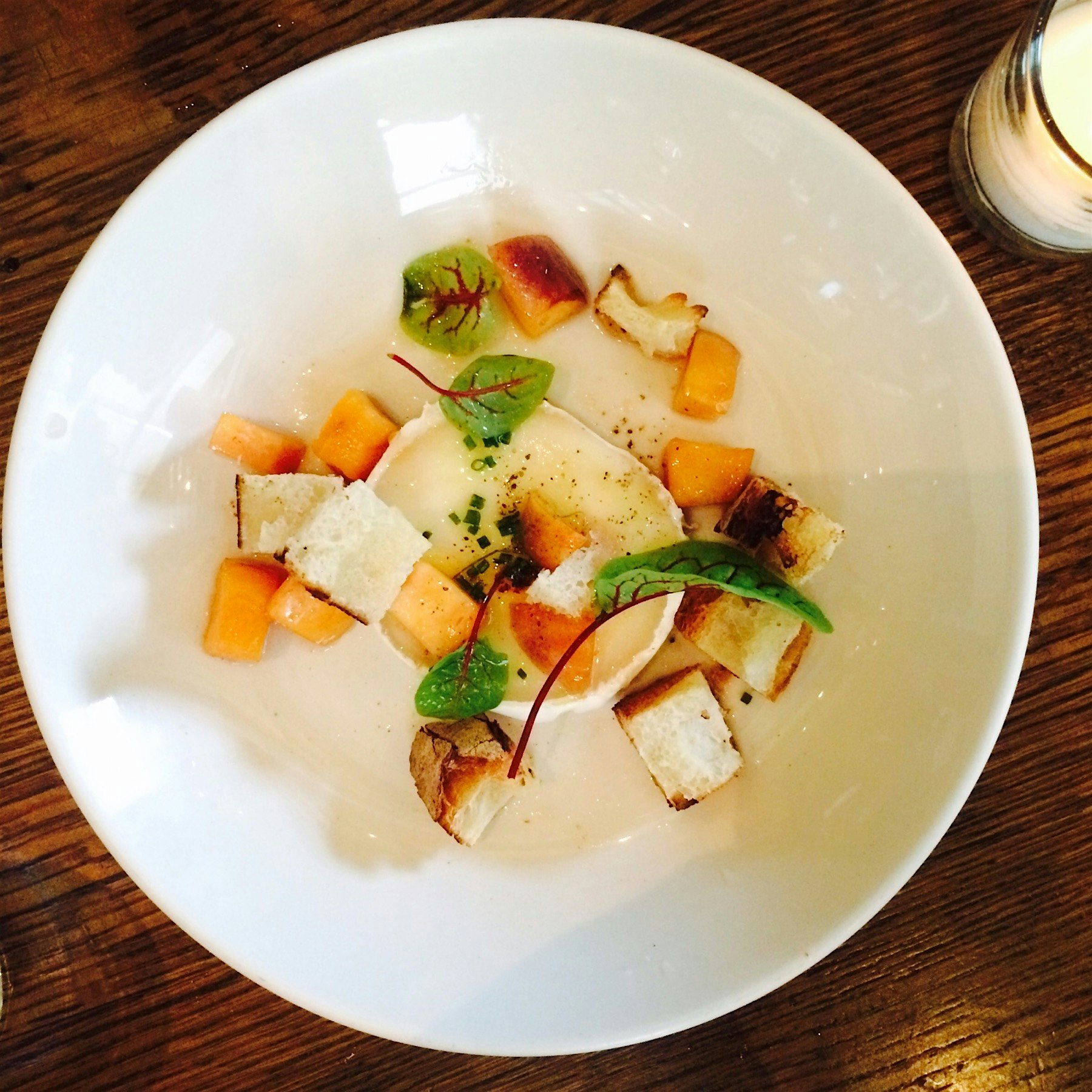 Compliments of the chef - soft goat cheese And nectarine for a savory sweet treat 