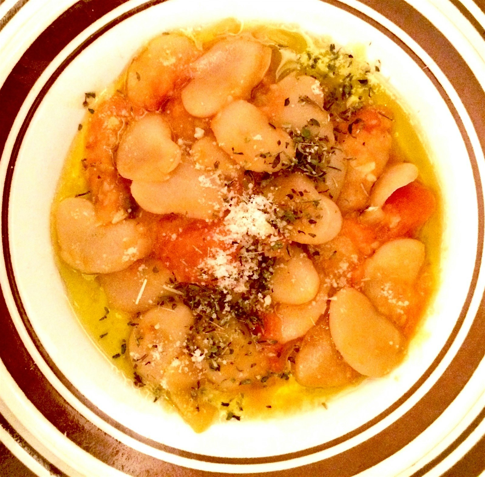 Part 1/2 of dinner last night. Butter Beans in Tomato Sauce, drizzled olive oil and oregano, Parm...