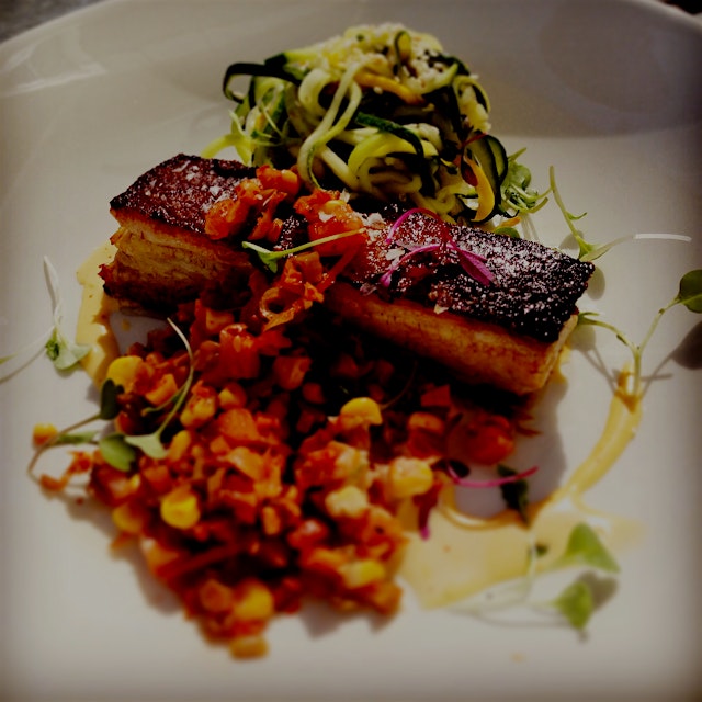 Crispy pork belly with our house kimchi and summer squash noodle salad. Using the kimchi juice to...