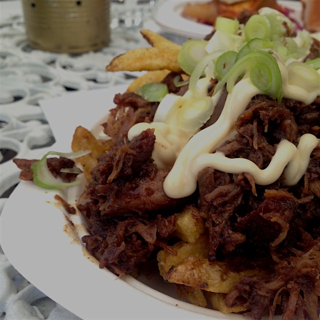 Sticky pork over hand-cut french fries - perfect winter comfort food. 