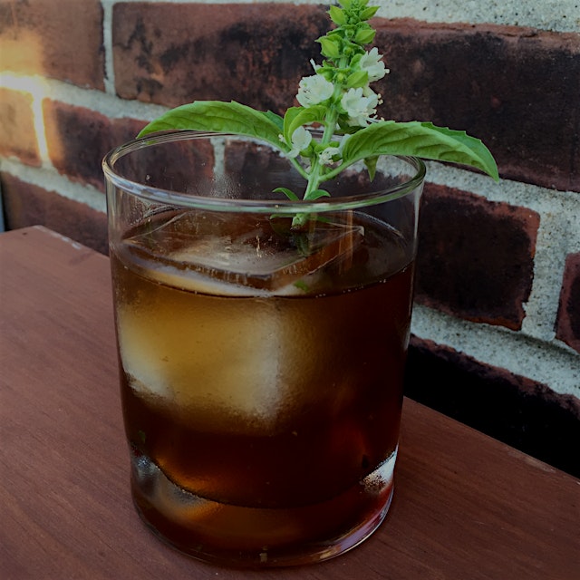 A basil manhattan on the rocks for one 🌿 