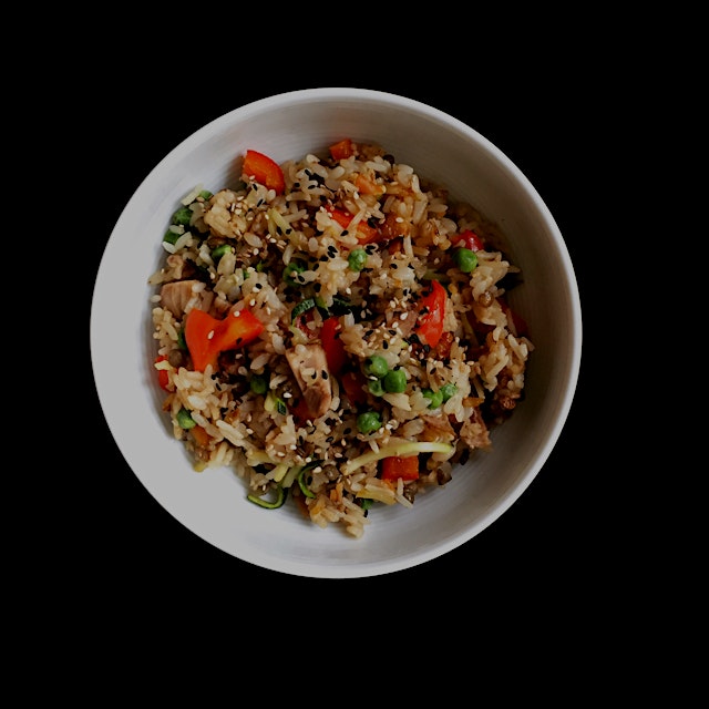 'Fridge-cleaning' fried rice! Left over roasted chicken, diced red bell pepper, peas, zucchini. T...