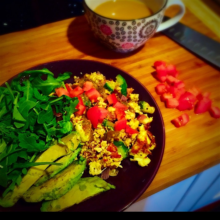 Happy Saturday! Egg scramble with zucchini, red onion, and homegrown tomatoes! Topped with fresh ...