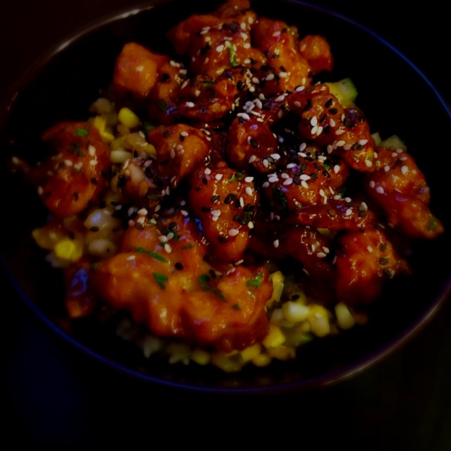 Pushed through the heat and made a tasty dinner. Mandarin chicken, a la Trader Ming, served on a ...