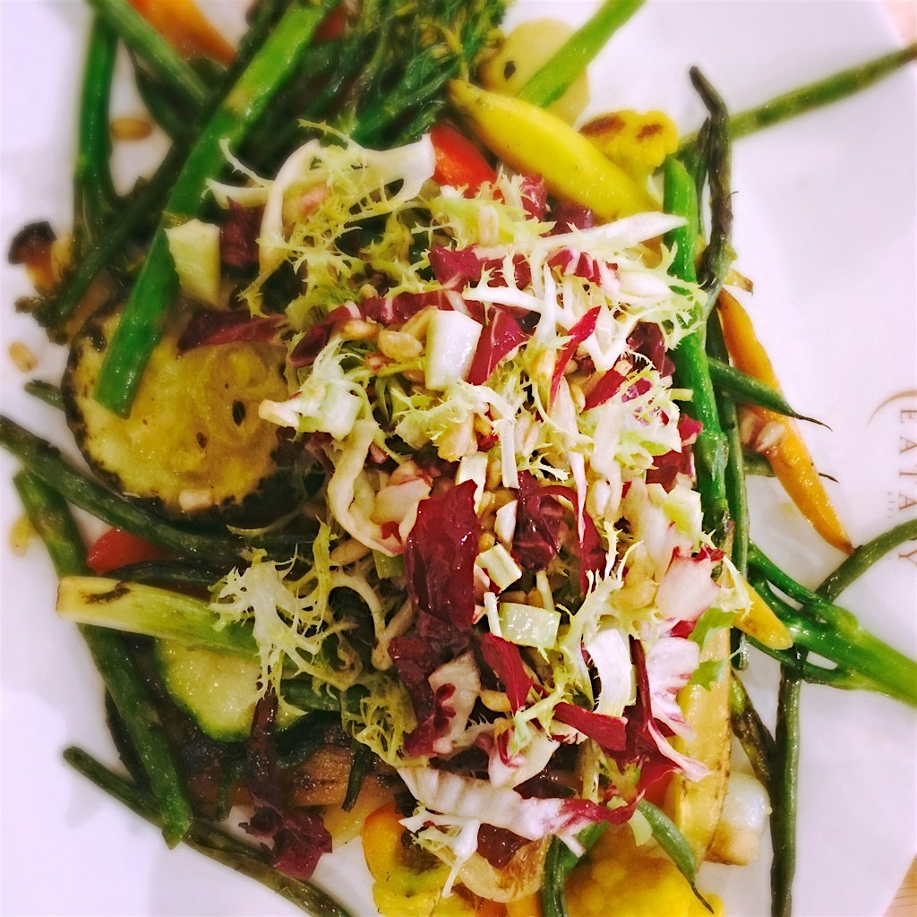 Mixed fresh veggies, warm, and Farro salad in a Nebiollo Vinagrette... Inside of Eataly Chicago!