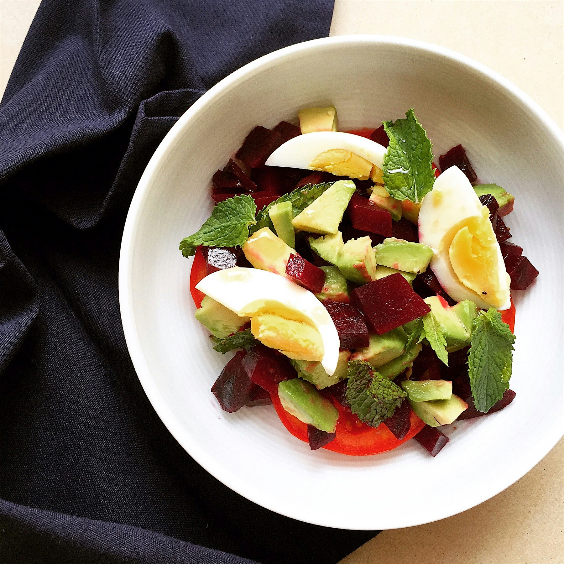 Beetroot, tomato, avocado, hard boiled egg and mint salad, in a sherry vinaigrette. The beetroot ...