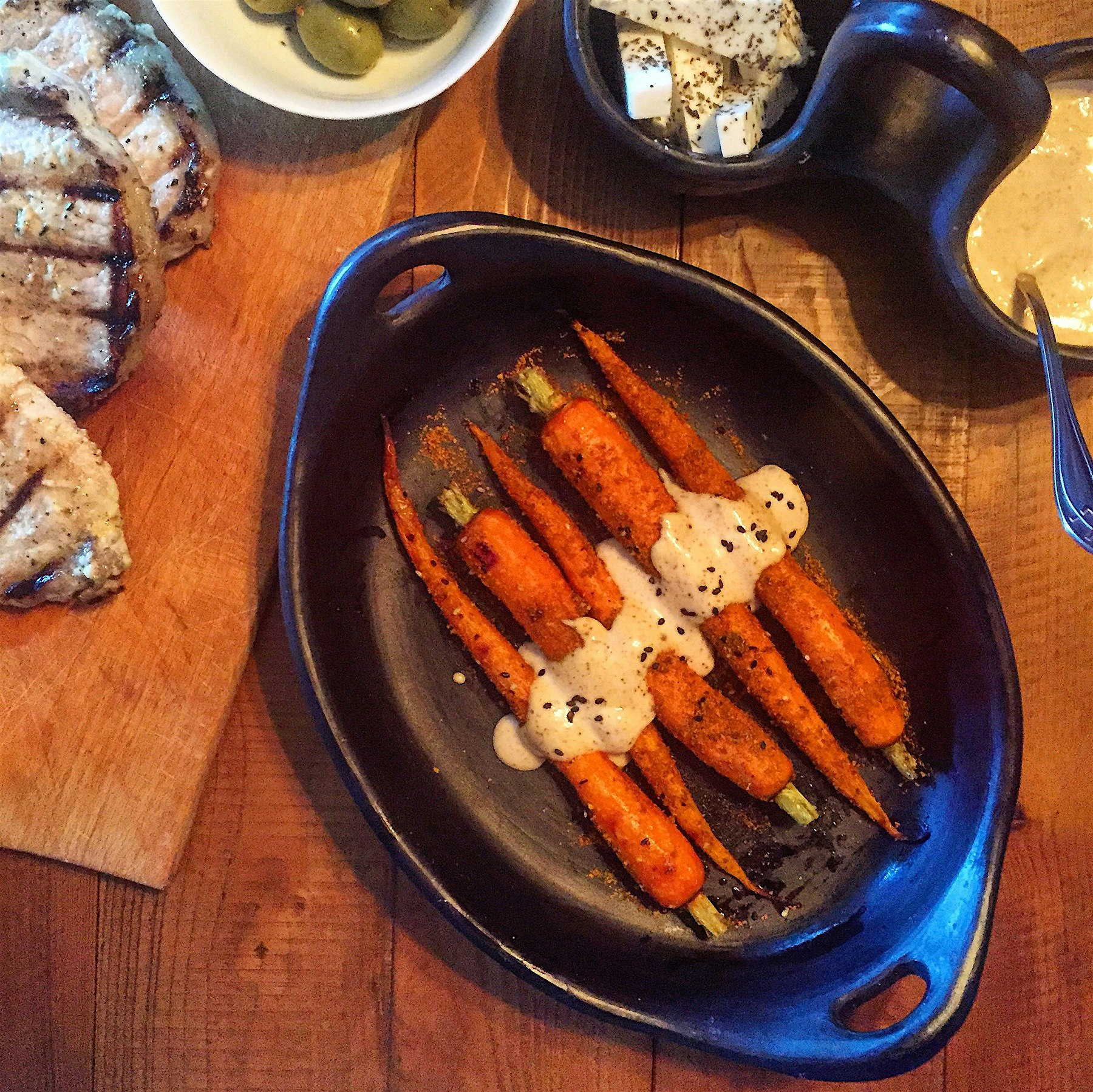 Roasted Carrots tossed in Dukka and drizzled with Harissa aioli. I think Bugs Bunny would approve. 
