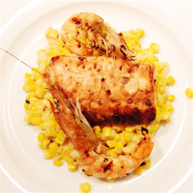 Cedar planked(bow and arrow caught) MD Snakehead and prawns with local corn, cream, and shallots ...