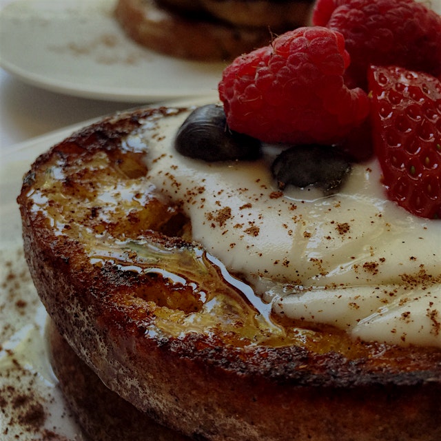 French toast with creme anglaise, berries, honey and cinnamon 