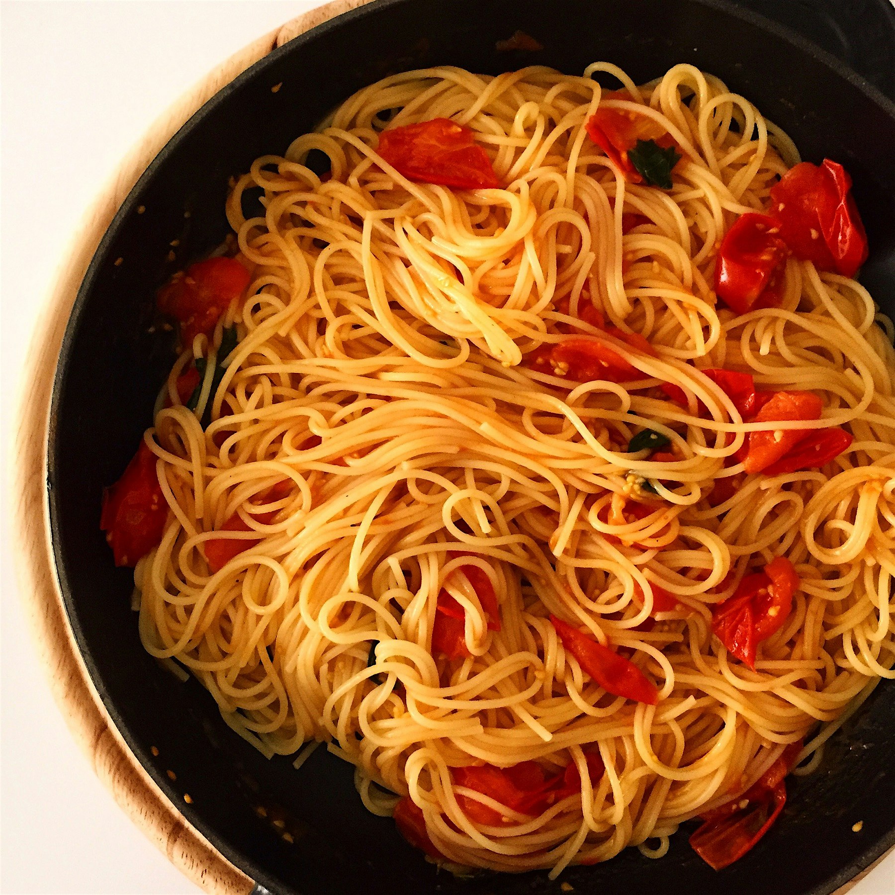 Our usual pasta Sunday: Spaghetti with cherry tomatoes. Recipe from 'five quarters' cookbook by R...