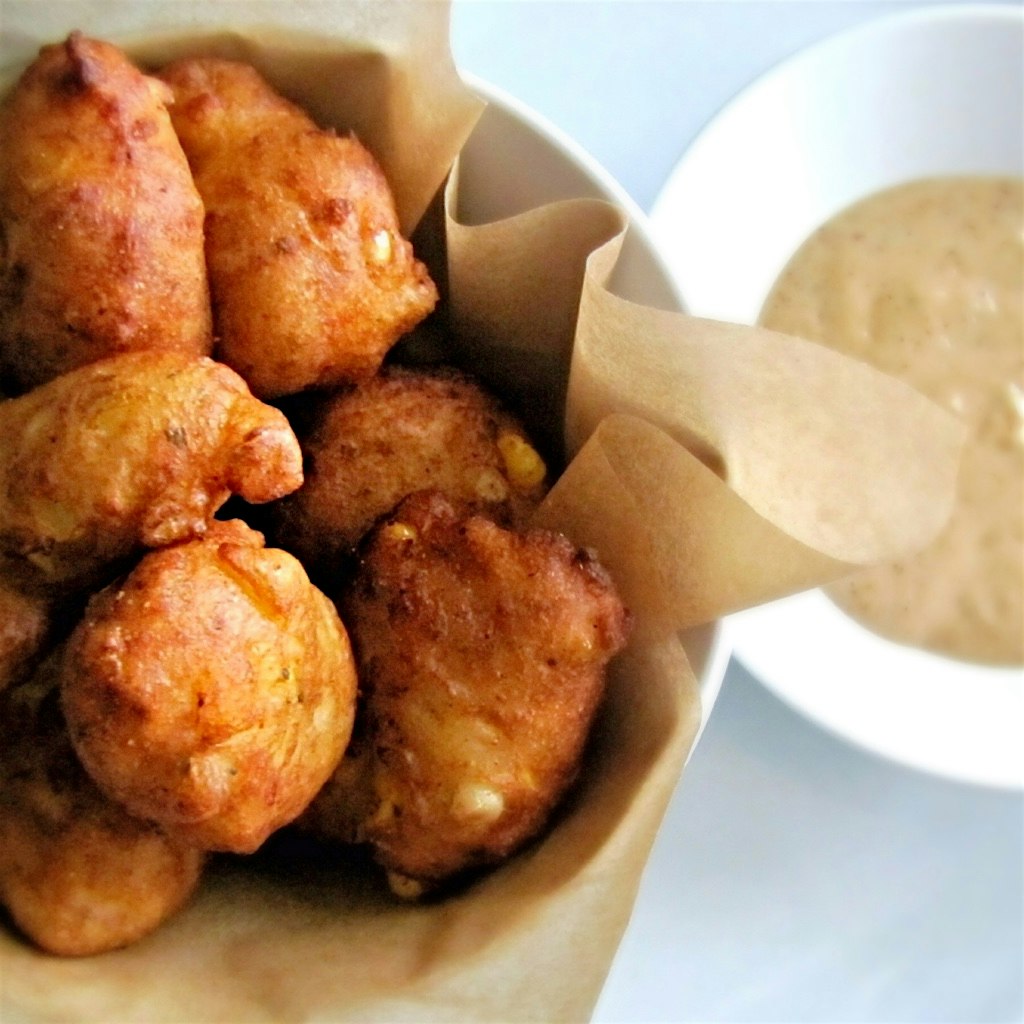 Shrimp and Jersey corn fritters with old bay sauce