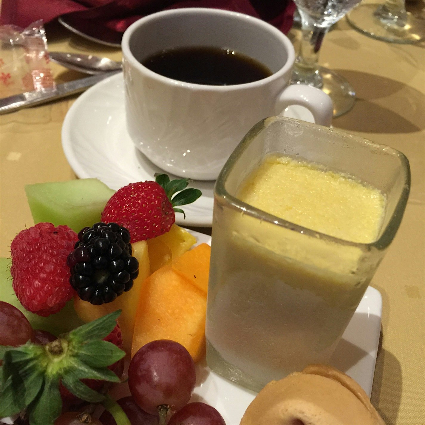 Good fortune.......Mango mousse, fresh fruit, and coffee. 