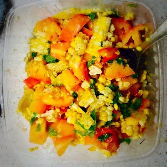 Salad of homegrown basil and heirlooms tomato, corn from farmers market!