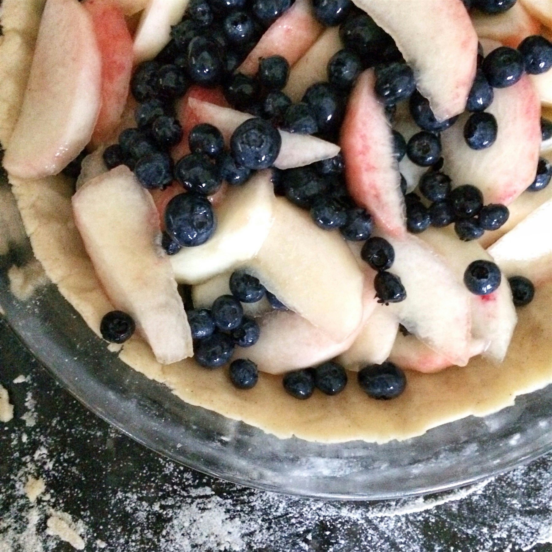 The start of my blueberry and white peach crumble pie! 
