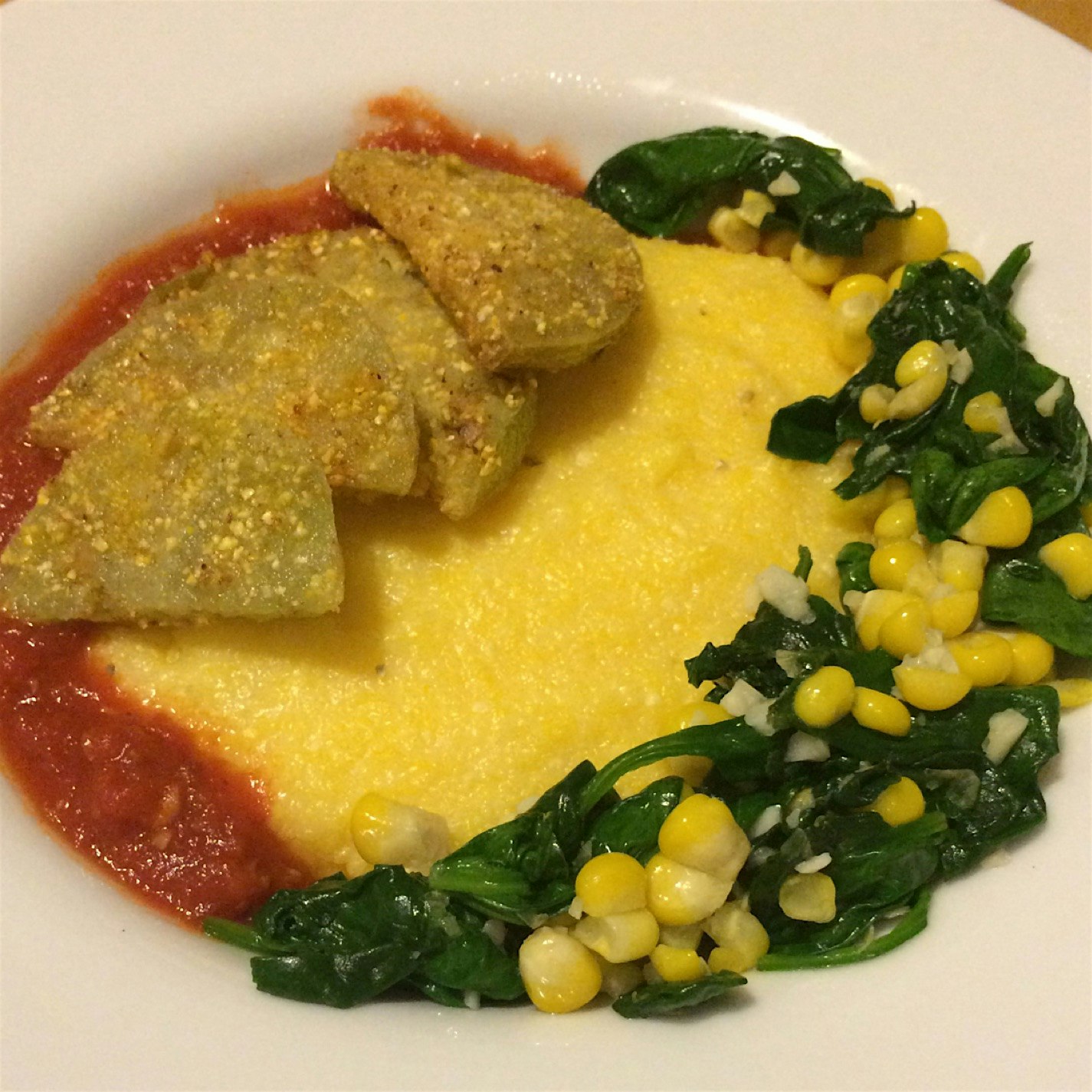 polenta with tomato sauce, garlicky spinach & corn, and fried green tomatoes