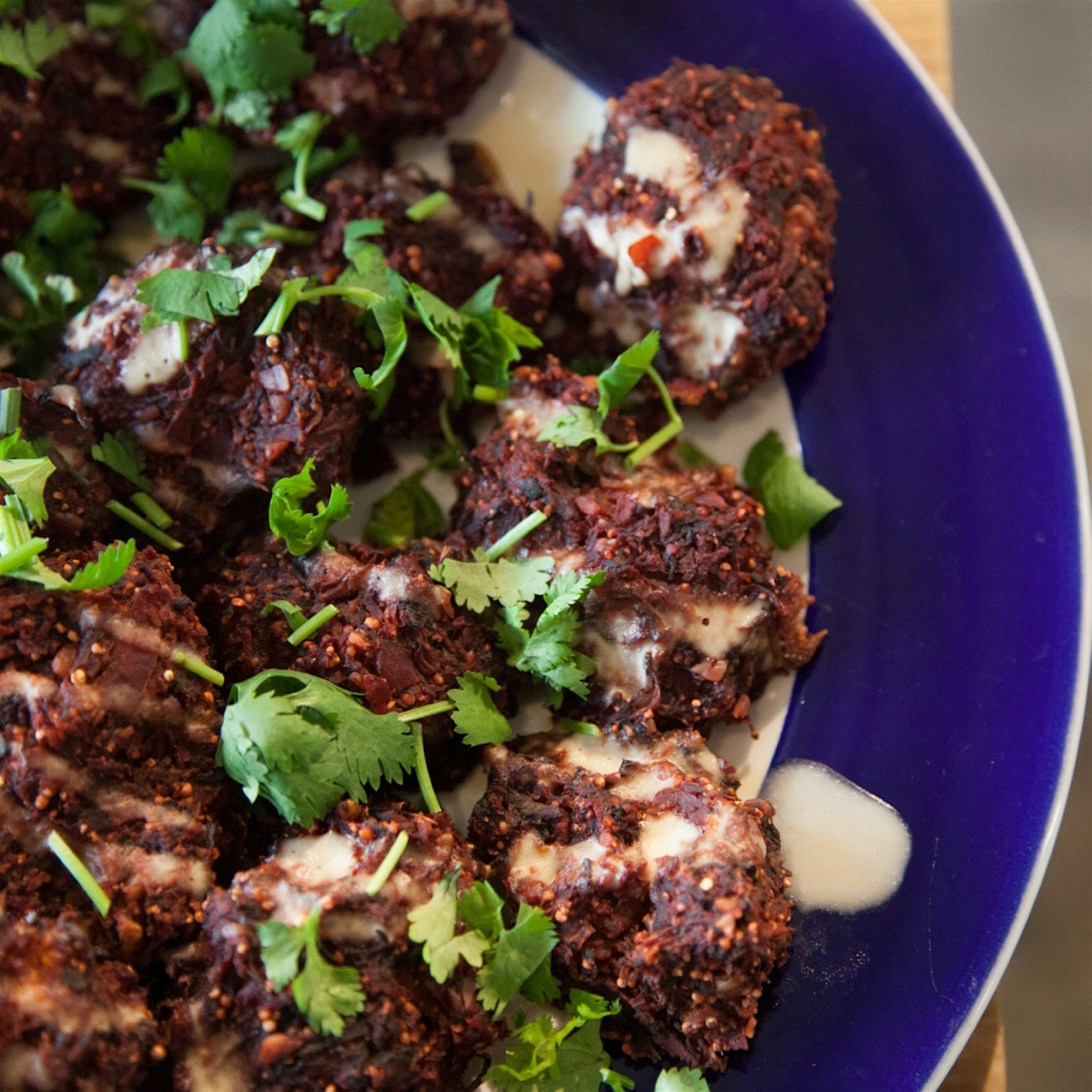 A beautifully-prepared beet falafel which is quite frankly, better than meatballs! Doused in a le...