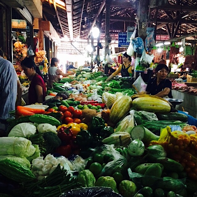 Bustling scene at the Old Market in Siem Reap! Right before our cooking class to learn traditiona...
