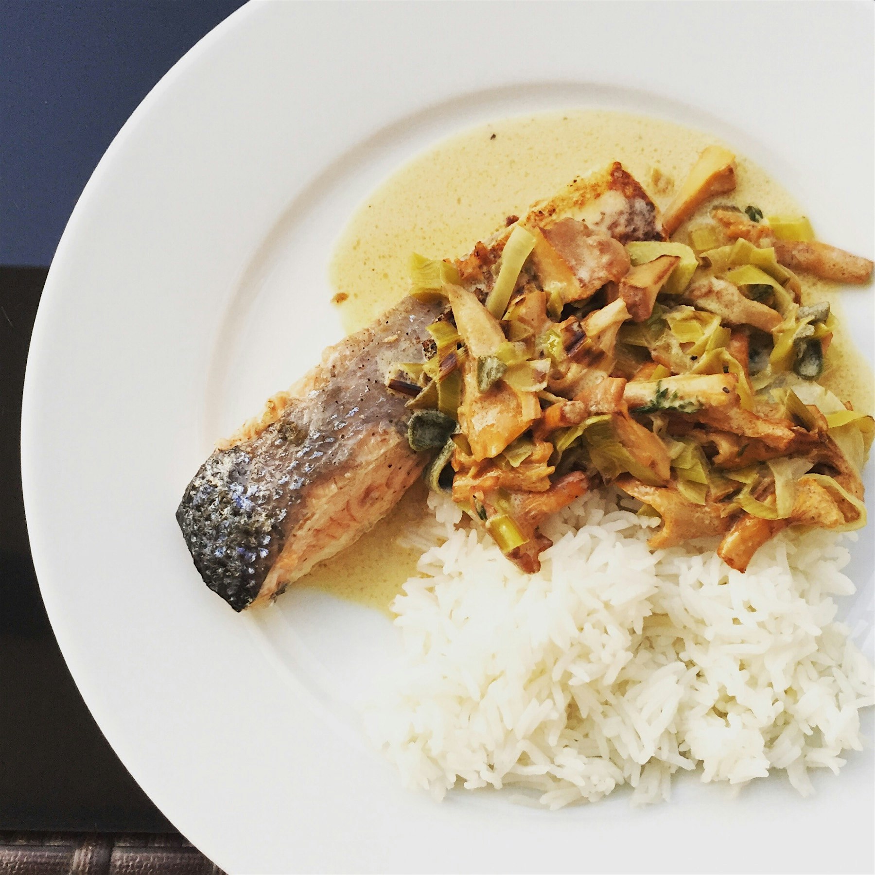 Pan-fried salmon with creamy Chantelle mushrooms and leek sauce, served with basmati rice