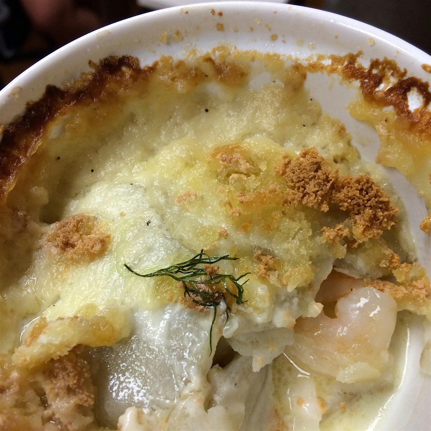 Dug in before the photo! Ramekin of sunchoke- shrimp gratin. So good!