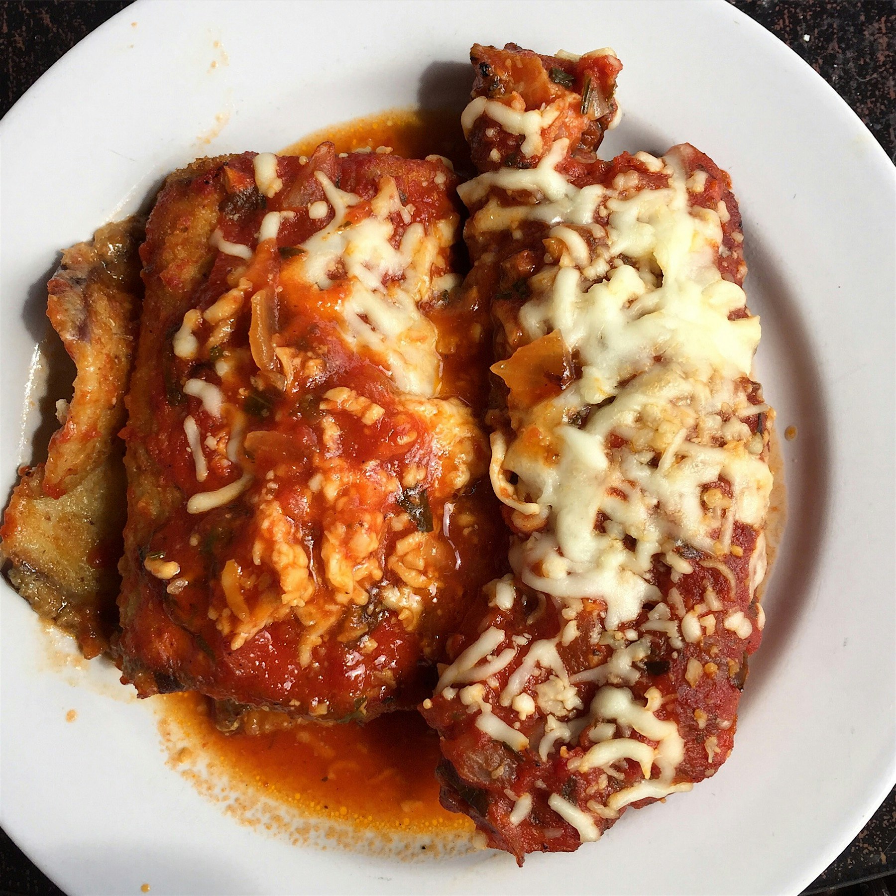 My mother made me this delicious lunch. Eggplant rollatini with grilled/braised pork ribs. 