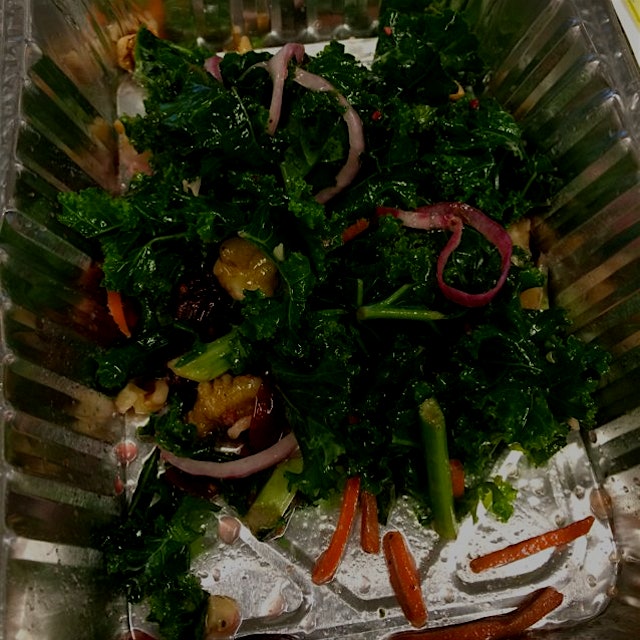 Kale, red onions, Cranberries, carrots and walnuts -- yummy! 