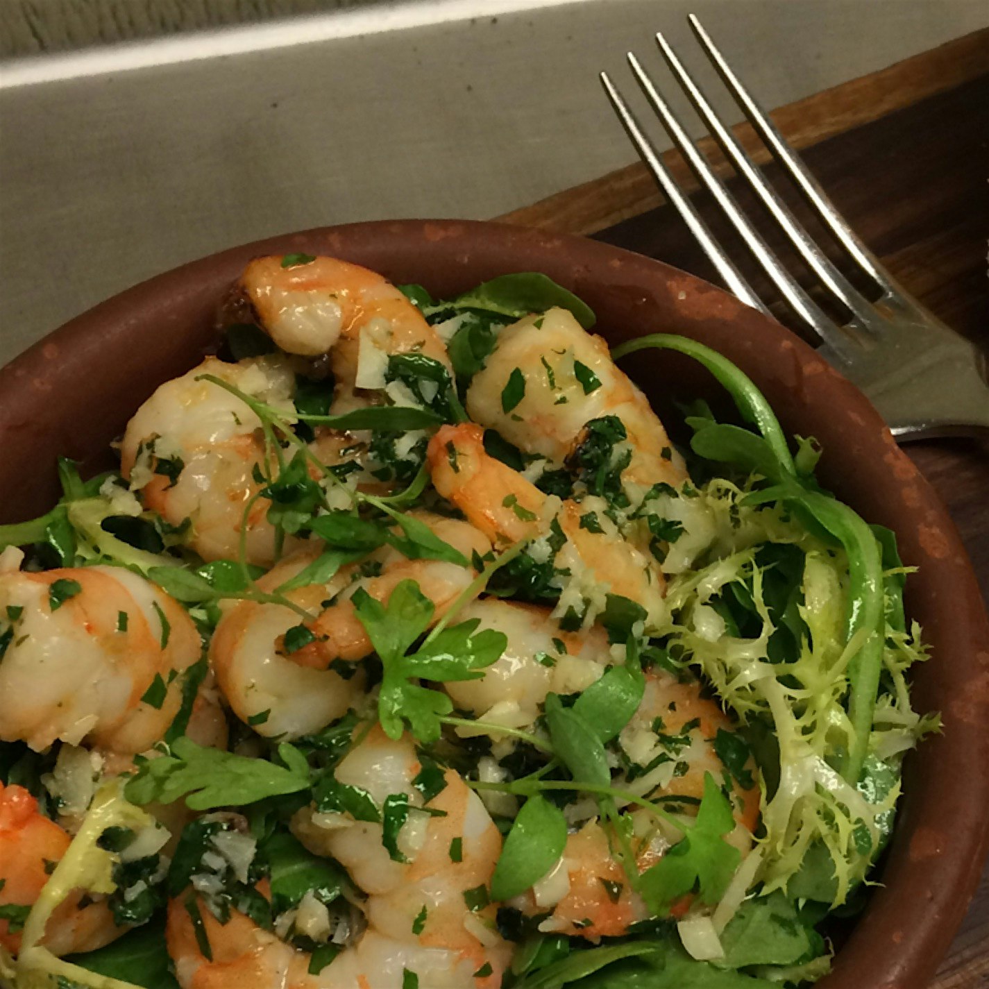 Nothing quicker to rustle together than some garlicky shrimp tossed with herbs and micro greens.