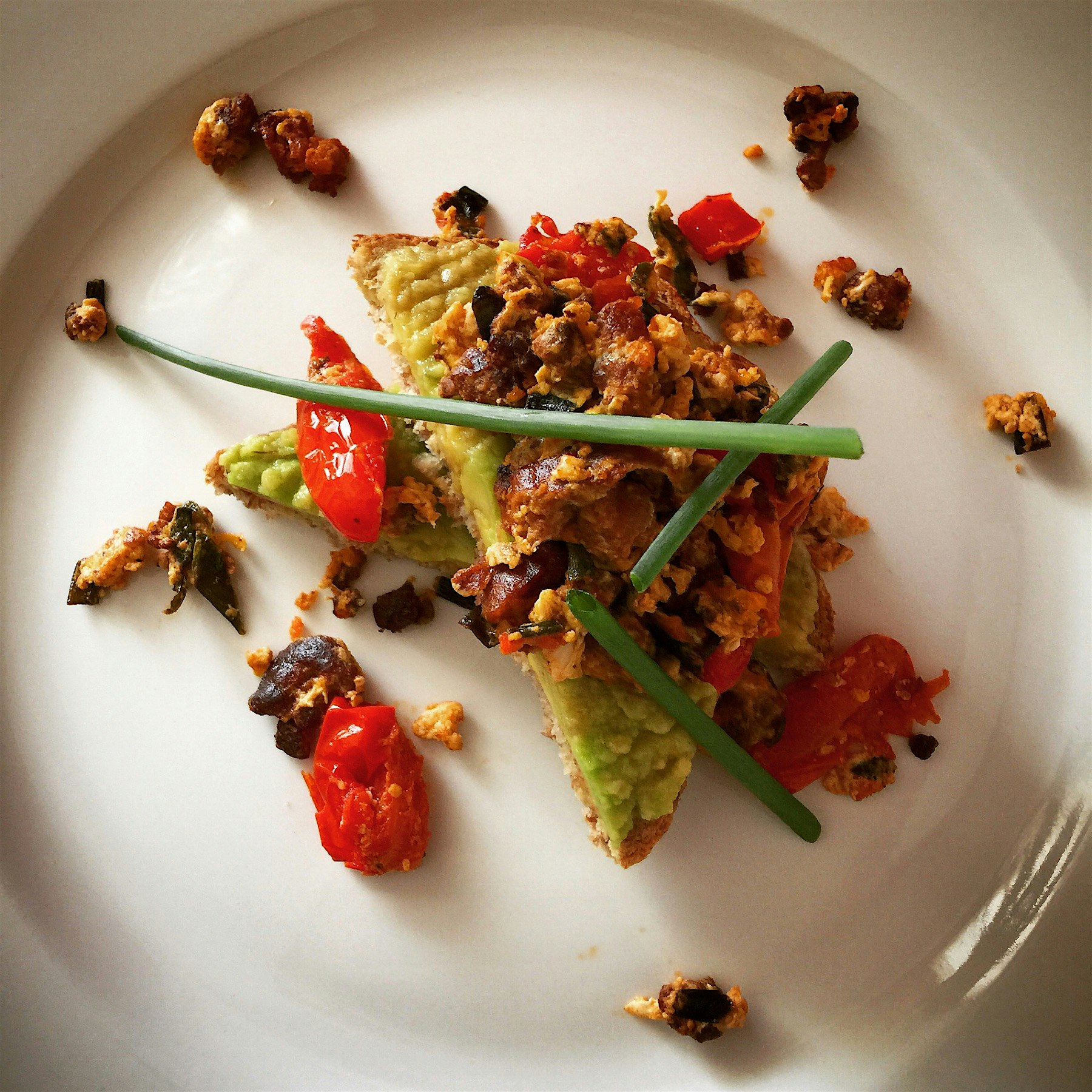 A perfectly delicious breakfast on this #MeatlessMonday! Tempeh-Chorizo Scramble over Ezekial Avo...