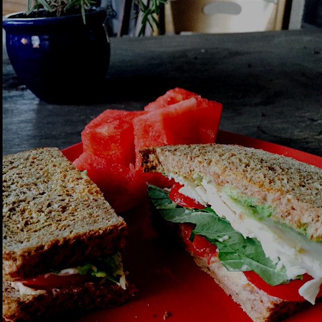 Turkey tomato avocado basil sandwich and watermelon feels like the last bites of summer!