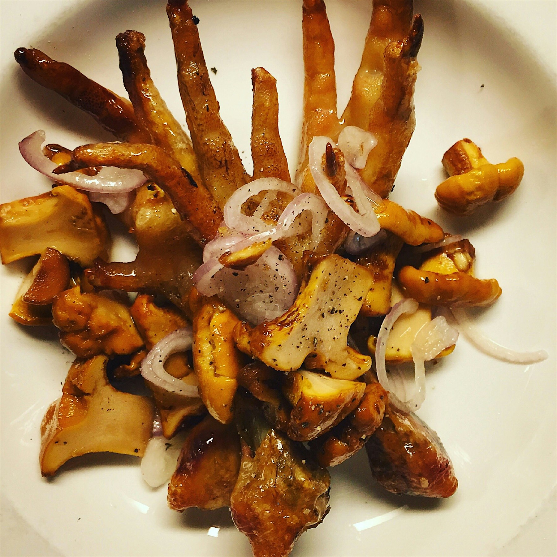 Chickens feet, pickled Chantelles tossed in raw local honey. 