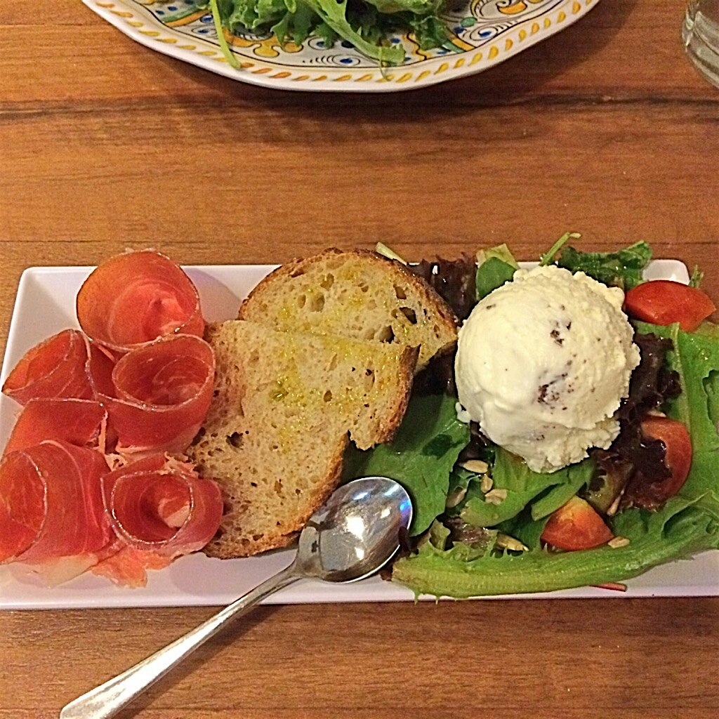 Lunch of savory goat cheese- chocolate chips gelato served with salad and prosciutto at my favori...
