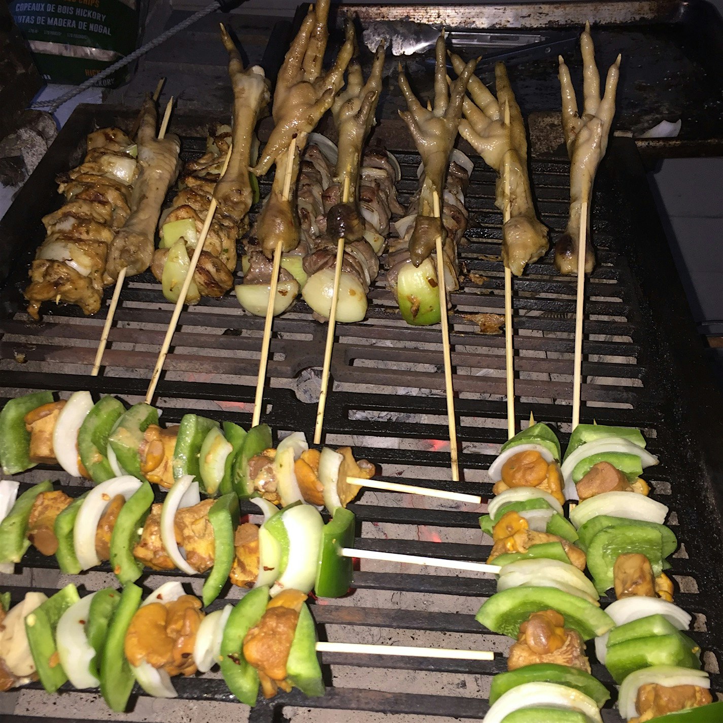 Wild turkey, venison and chanterelle skewers + delicious chicken feet all grilled. 