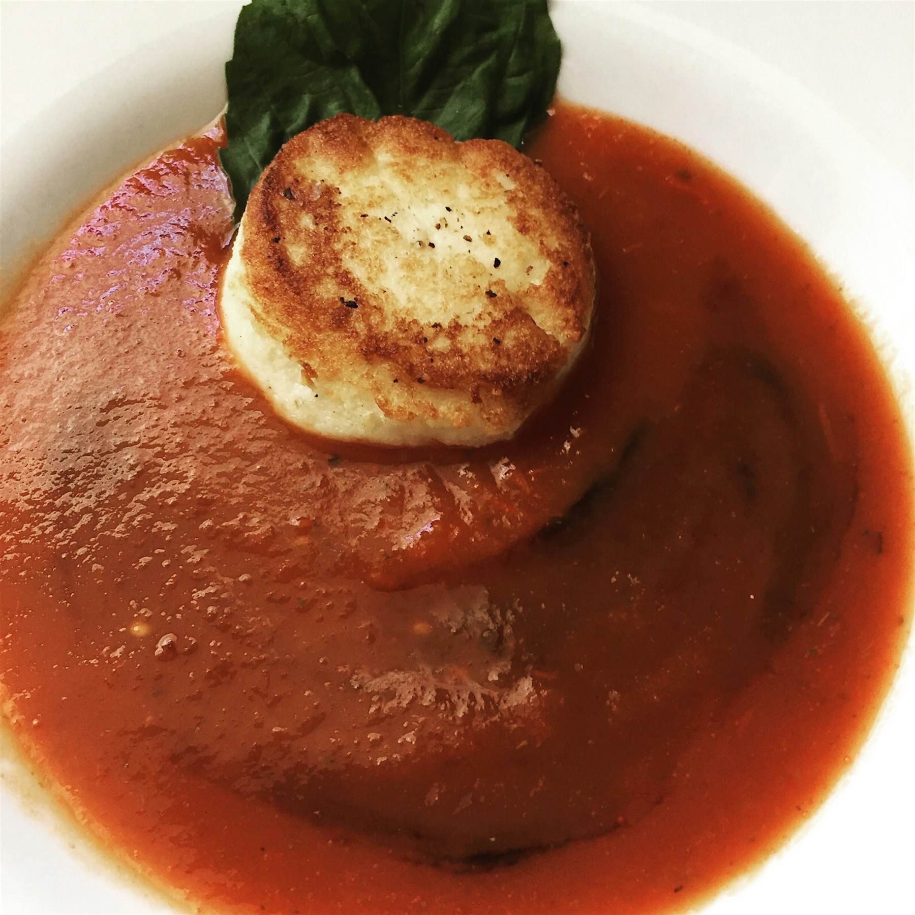 A twist on a classic... Tomato Basil Soup with Balsamic Gastrique and Fried Mozzarella...   Vegan...