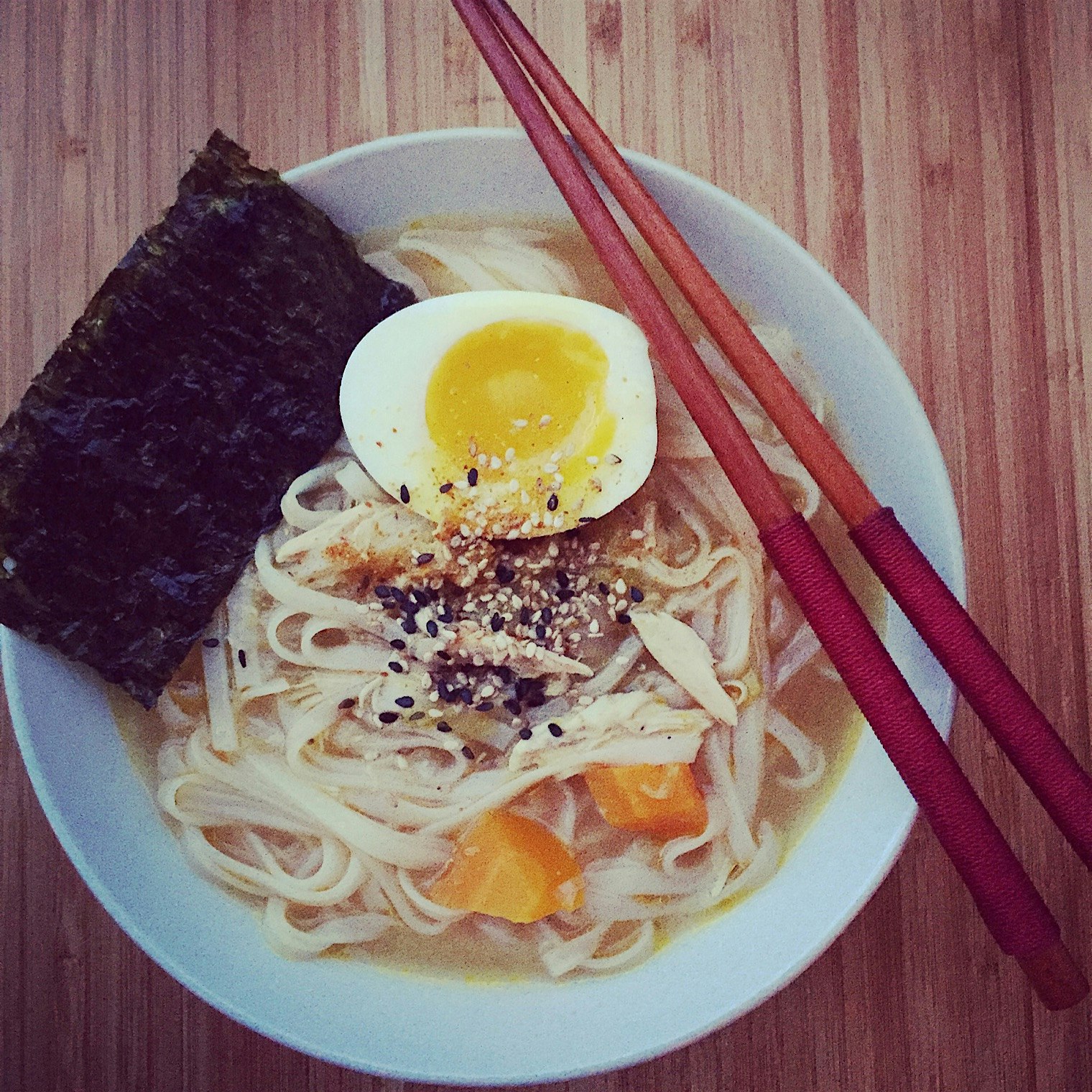 Last night we had rice noodles in chicken miso broth topped with soft boiled egg and toasted nori...