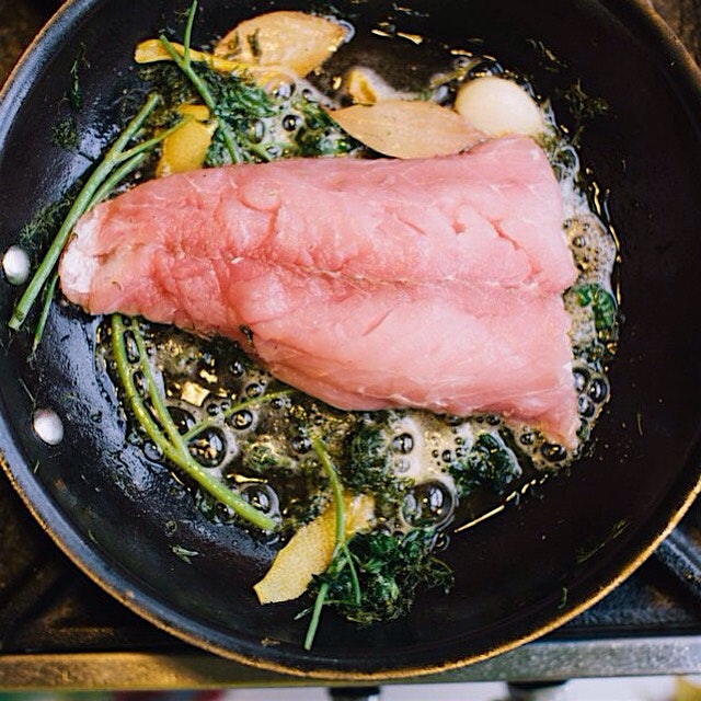 Frying up some red snapper to make some crispy fish wraps.