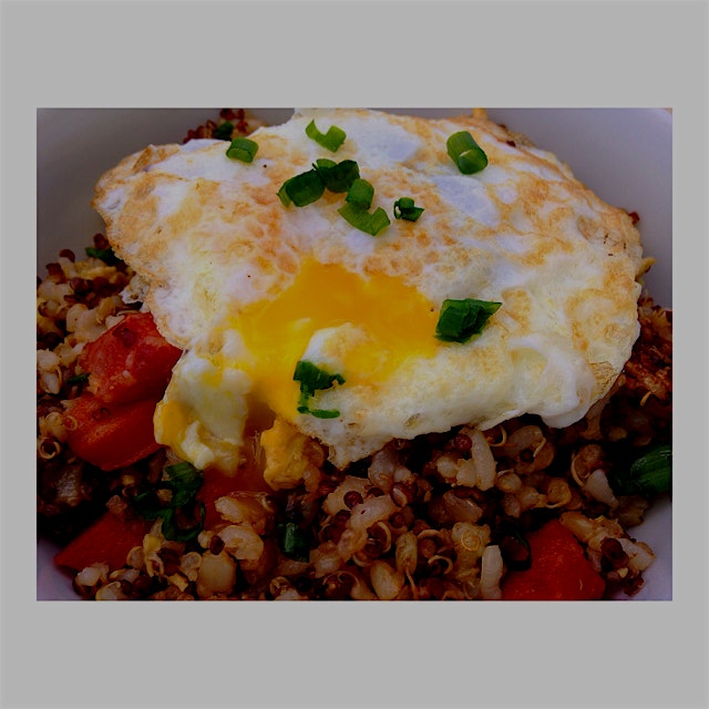 Quinoa Garlic "fried rice" with Portuguese Sausage & an over easy egg. 