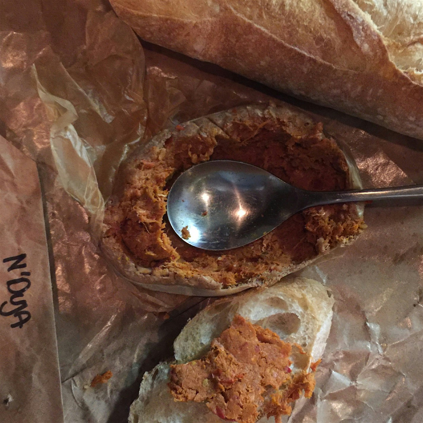 N'duja is salami spice cured beef that is served as a spread to put on baguette and any other bre...