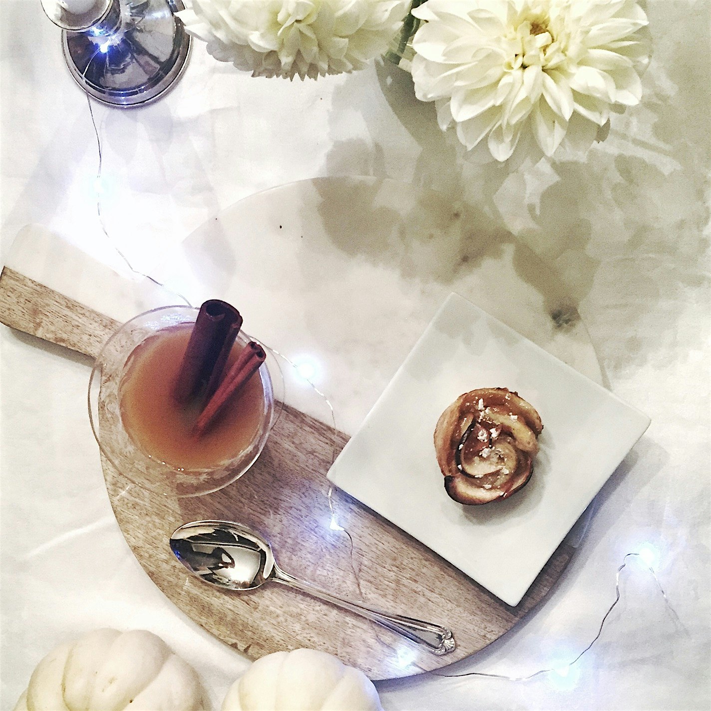 Happy Canadian Thanksgiving. Here we're sharing spiced apple cider with baked apple blossoms. 