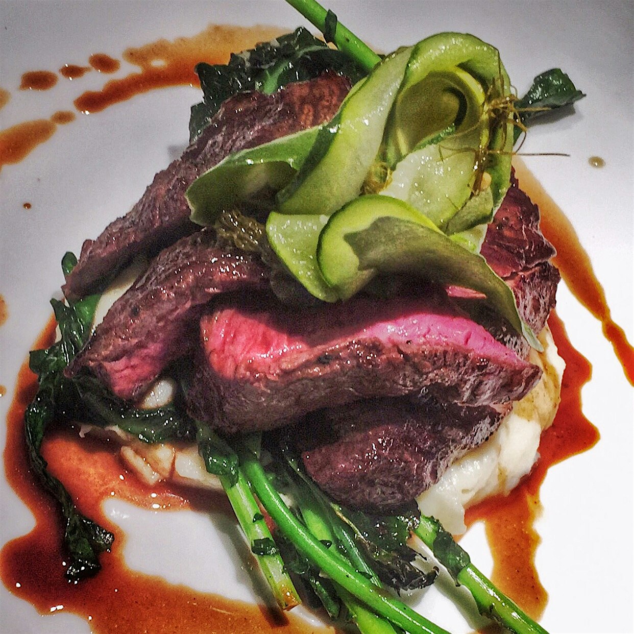 Hanger steak / rapini / pomme aligot / Pickles / Demi---

Pomme aligot - cheese curds stretched i...