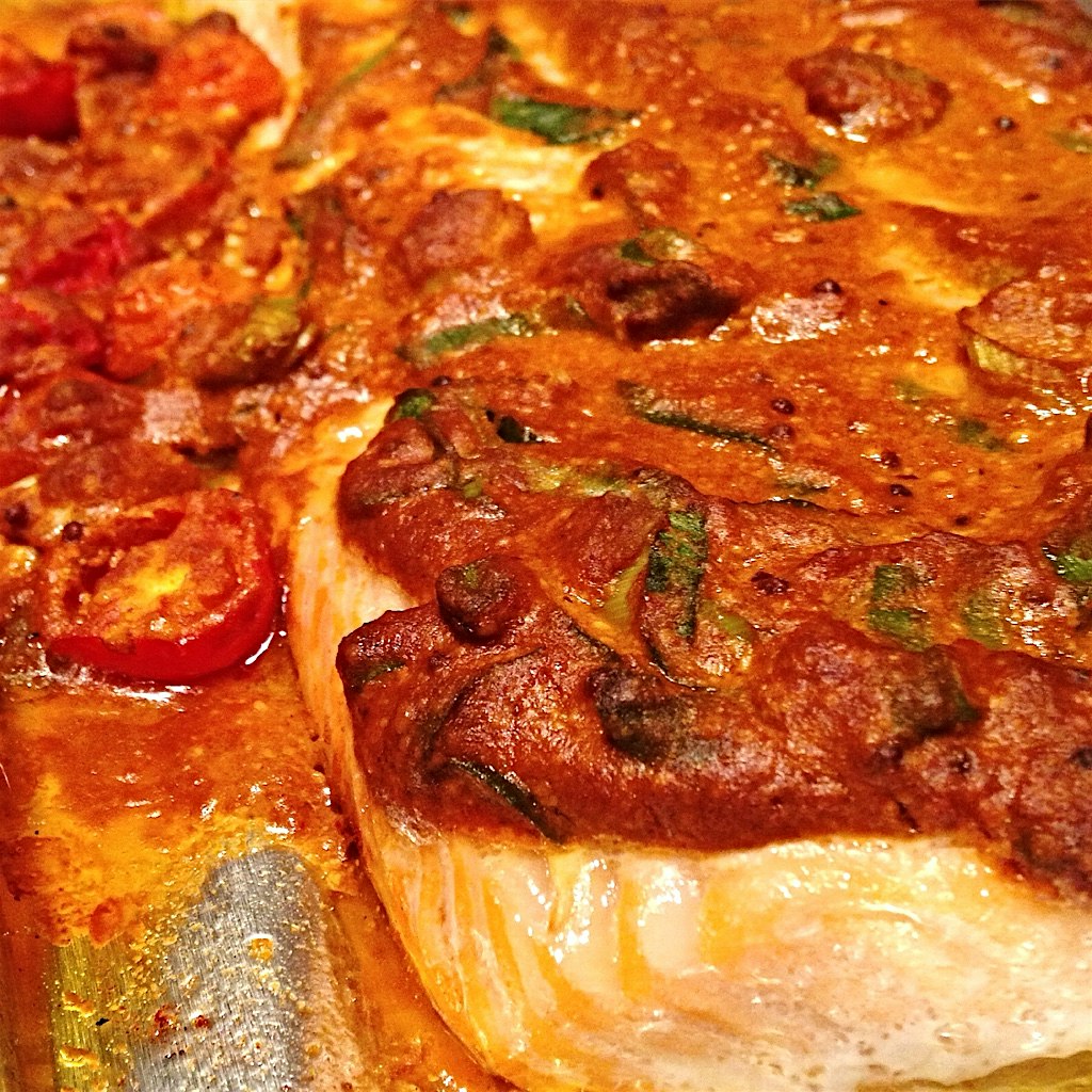 Lazy (and quick!) weeknight salmon curry: Curry, mustard and fenugreek seeds, scallions, tomatoes...