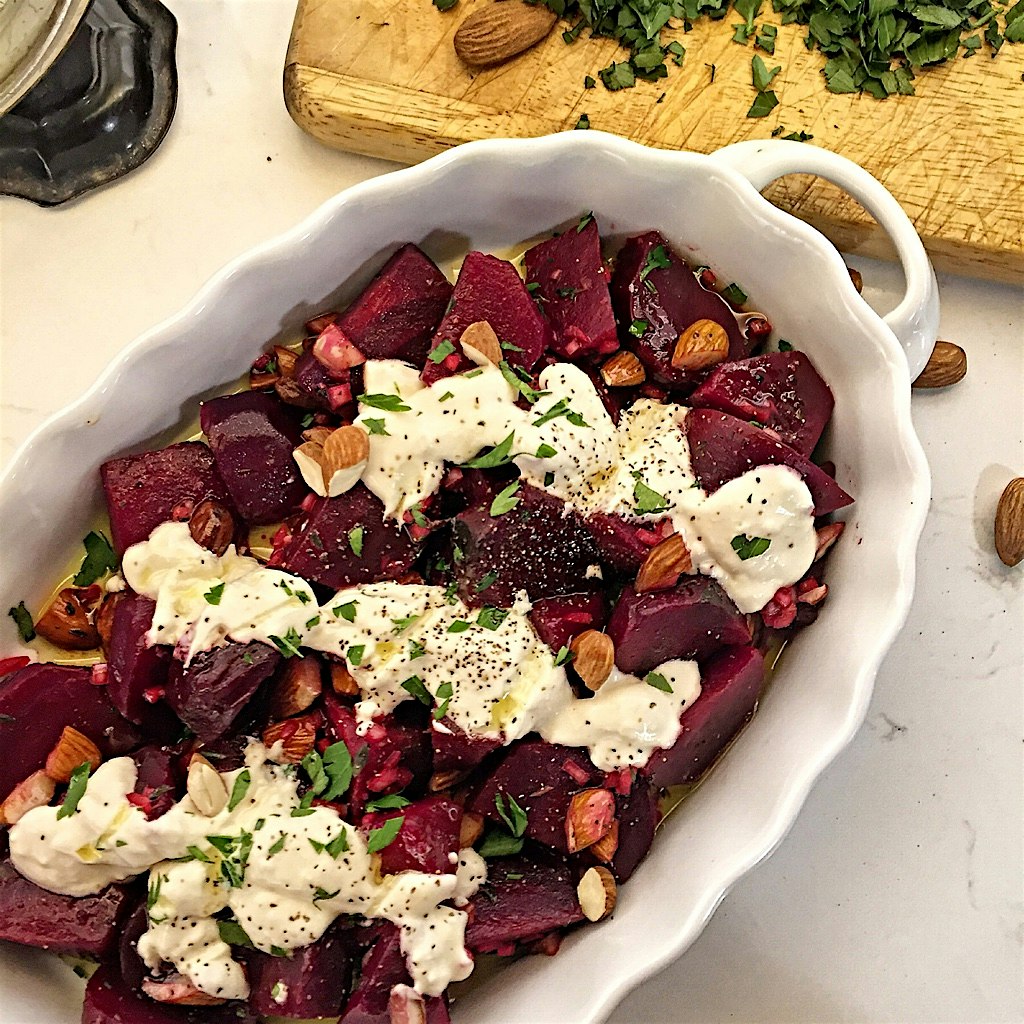Roasted beets in a sherry vinaigrette with almonds and horseradish spiked creme fraiche. Intrigui...