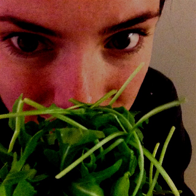 Hiding behind some arugula for Food Day 2015! One of my fave greens to add to... Almost any meal ...