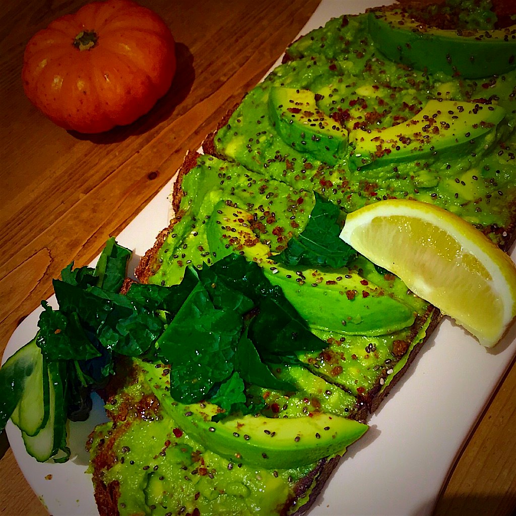 No green filter needed! This beautiful breakfast of Avocado Toast, topped with Kale, Cucumber, an...